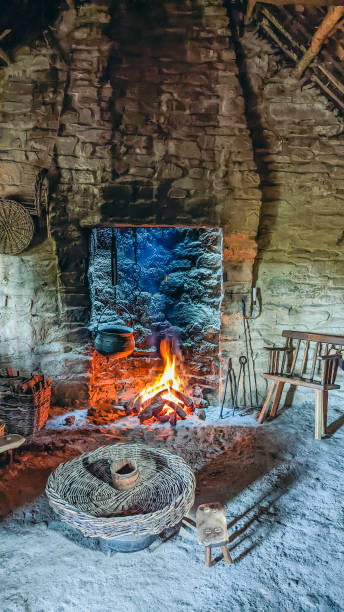 istock Cast iron cauldron over an open turf fire in a traditional Irish cottage. 1481354499