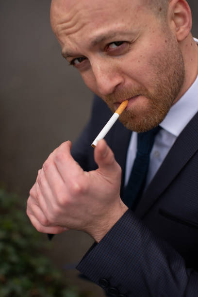 istock Portrait of a man smoking a cigarette 1481360359
