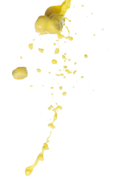 istock Banana juice flying fall down, yellow banana chopped slice juice wave explode. Yellow paint color splash throwing in Air. White background Isolated high speed shutter, throwing freeze stop motion 1481361485