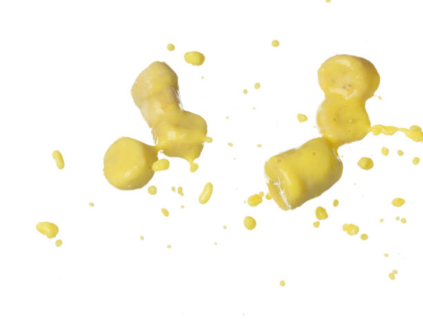 istock Banana juice flying fall down, yellow banana chopped slice juice wave explode. Yellow paint color splash throwing in Air. White background Isolated high speed shutter, throwing freeze stop motion 1481361547