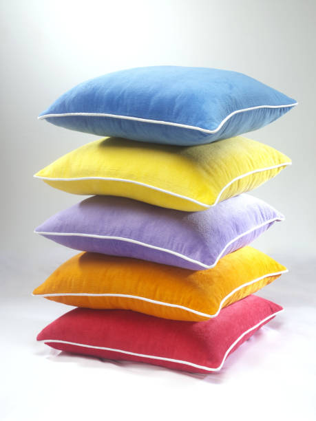 istock Colorful cushion, pillow tower on white 1481364618