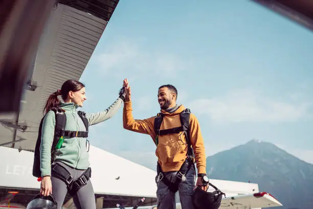 Photo of Friends preparing for Skydiving