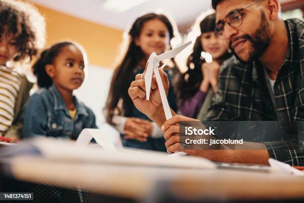 Diverse Young Students Learn About Wind Power During A Science Lesson In Elementary School Stock Photo - Download Image Now