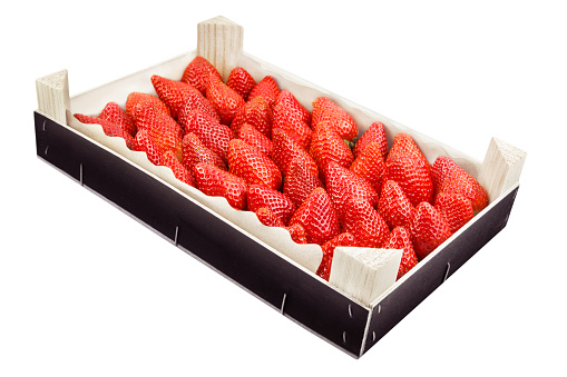Fresh strawberries and wooden box isolated white background