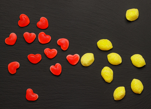 coloured red and yellow jelly beans