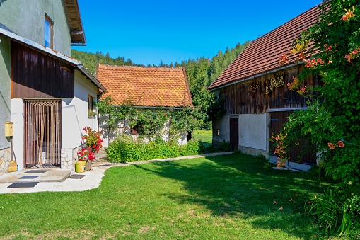 Plitvicka Jezera, Croatia – September 01, 2021: A grand residence, surrounded by lush greenery in a picturesque garden, Plitvicka Jezera, Croatia