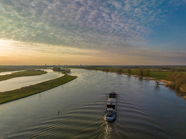 istock Ship sailing on the river IJssel during sunset panoramic bird's eye view 1481384810