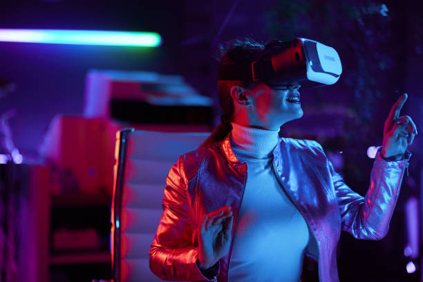 istock curious woman designing virtual reality in office 1481387468