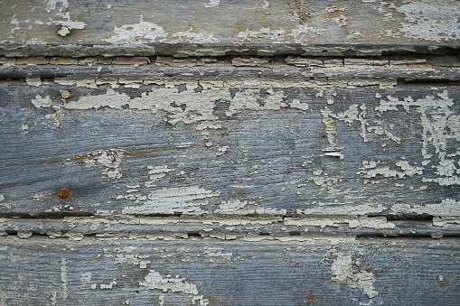 tornout paint wooden wall detail from an old house at istanbul prince's islands