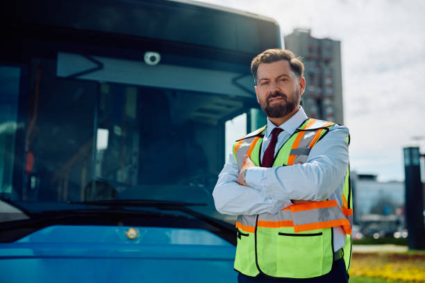 istock Portrait of confident bus driver looking at camera. 1481399729