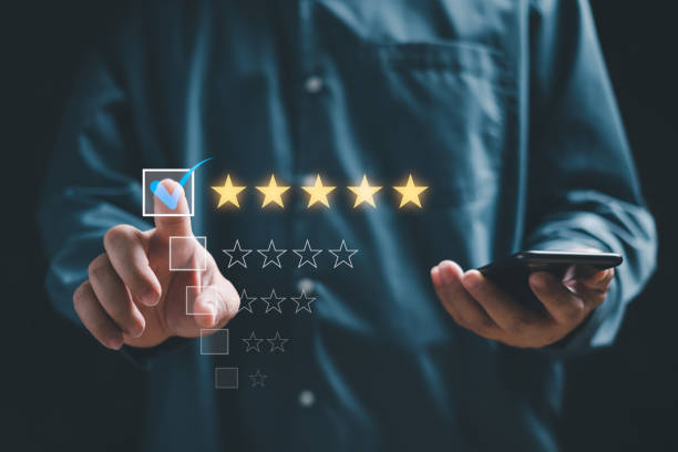 istock Customer rating to the service experience and service experience rating online application,People use smartphone to satisfaction feedback review 5-Star  Rate the satisfaction with the production 1481409042