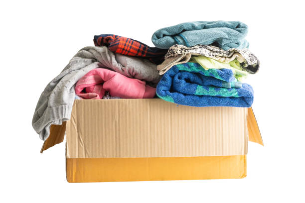 istock Donation box with used clothes isolated on white background with clipping path to support help for poor people in the world. 1481415607