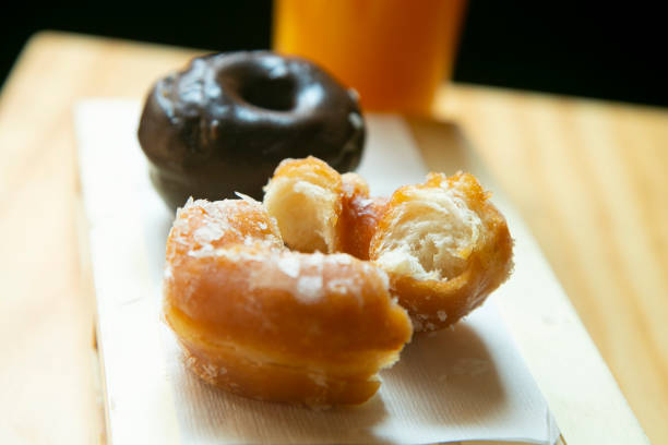 istock A half eaten donut is on a white paper 1481418246