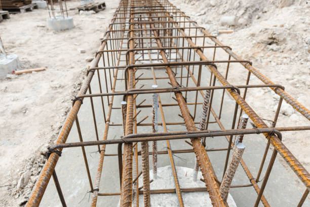 istock Monolithic foundation with metal reinforcement. Reinforcement construction mesh. Concrete pile foundation after completed for new construction site. The construction tool for monolithic works. 1481418362