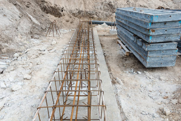 istock Monolithic foundation with metal reinforcement. Reinforcement construction mesh. Concrete pile foundation after completed for new construction site. The construction tool for monolithic works. 1481418366