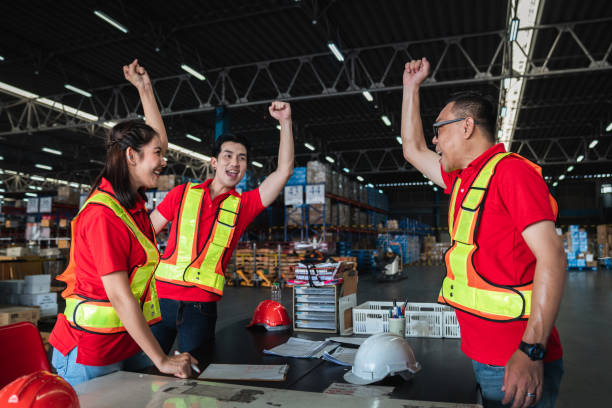 istock Group warehouse workers stack hand to celebrate and be happy in the warehouse., Industrial and industrial concept. 1481423443