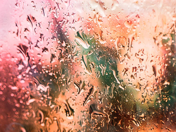istock Raindrops on glass. Flowing drops of water 1481424094