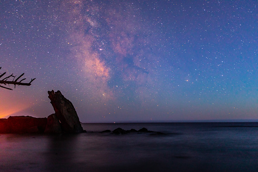 Dreamy and Beautiful Pastel Milky Way Sky over Pacific Ocean in Washington State. Astrophotography.