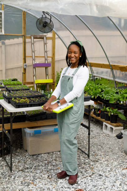 istock Farmer In Her Greenhouse 1481425659