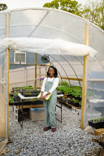 istock Farmer In Her Greenhouse 1481425662