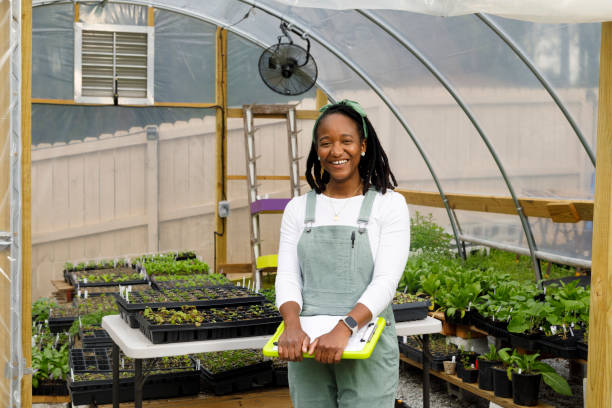 istock Farmer In Her Greenhouse 1481425663