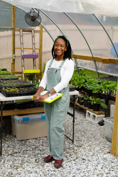 istock Farmer In Her Greenhouse 1481425664