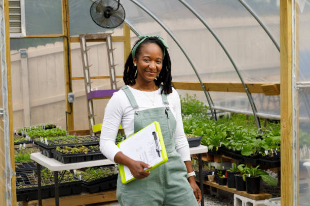 istock Farmer In Her Greenhouse 1481425674