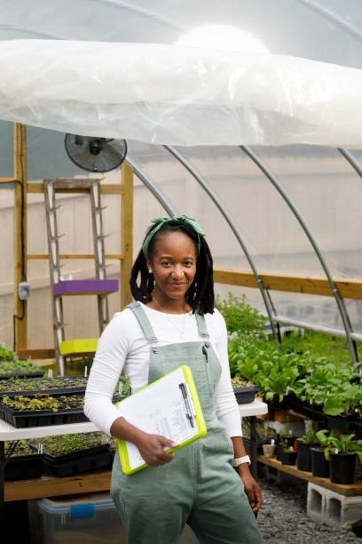 istock Farmer In Her Greenhouse 1481425675