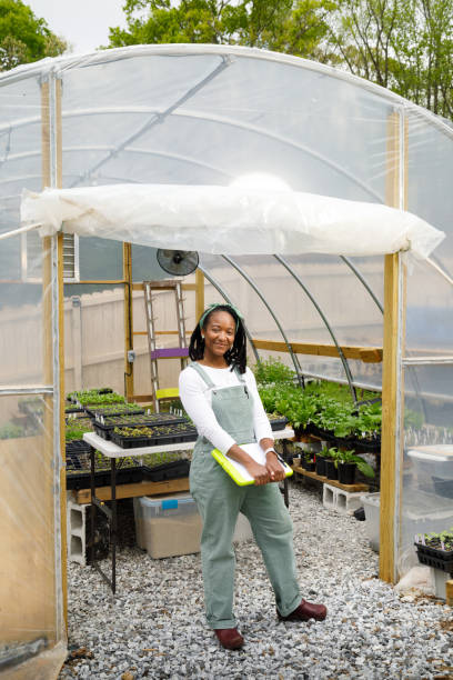 istock Farmer In Her Greenhouse 1481425677