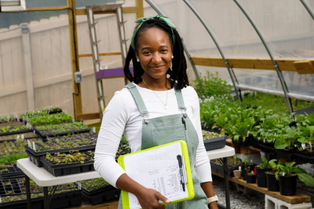 istock Farmer In Her Greenhouse 1481425682