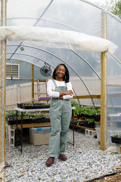 istock Farmer In Her Greenhouse 1481425693