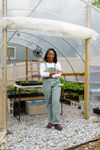 istock Farmer In Her Greenhouse 1481425696