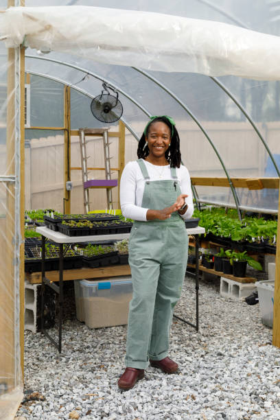 istock Farmer In Her Greenhouse 1481425712