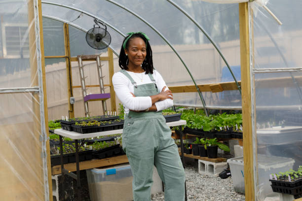 istock Farmer In Her Greenhouse 1481425715