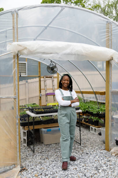 istock Farmer In Her Greenhouse 1481425727