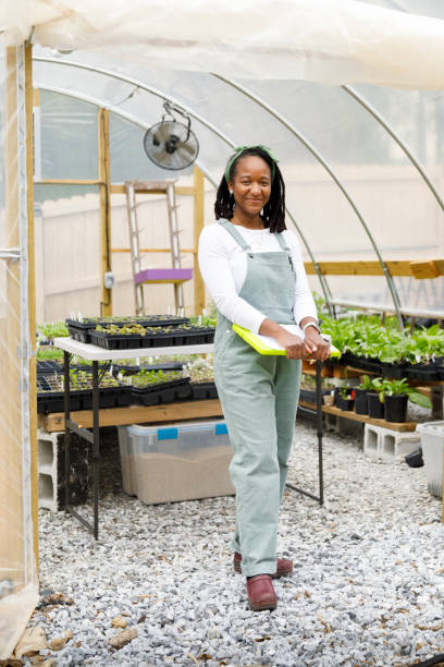 istock Farmer In Her Greenhouse 1481425736