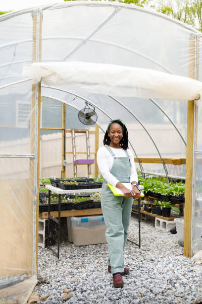istock Farmer In Her Greenhouse 1481425741