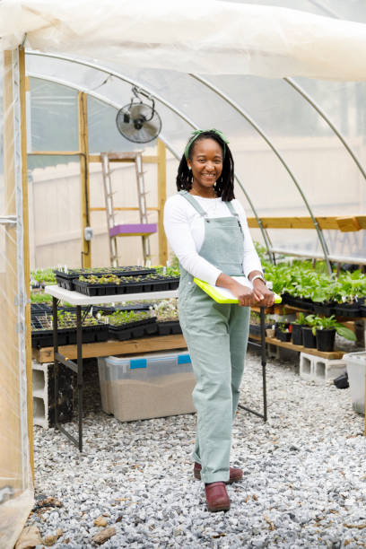 istock Farmer In Her Greenhouse 1481425745