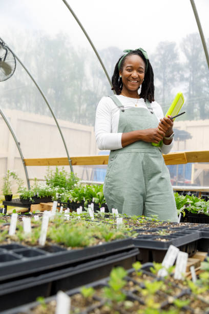 istock Farmer In Her Greenhouse 1481425806
