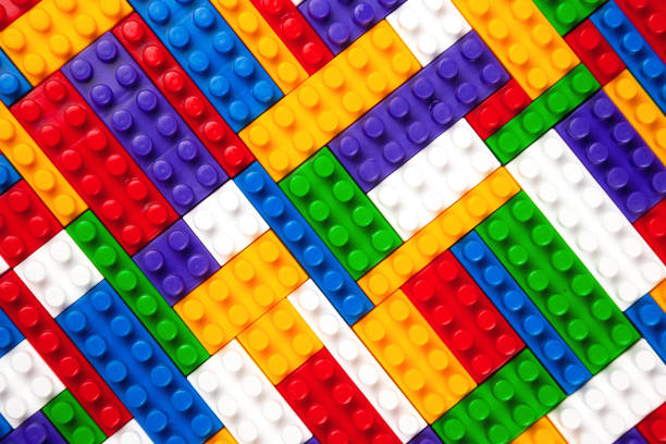 istock Abstract background texture of colored constructor blocks. Background of colorful plastic part of constructor. Pile of colored toy bricks. 1481431476