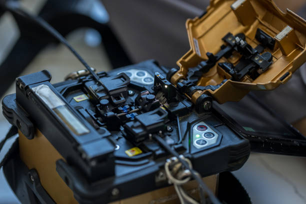 istock Optical fiber installation with Digital Fiber Optical Fusion Splicing machine. 1481432460