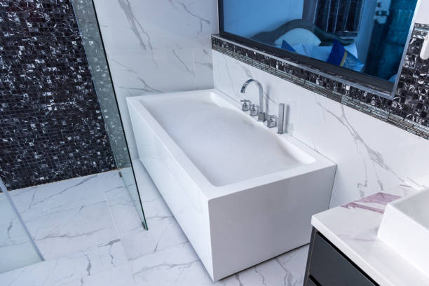 istock Bath tub with White foam soap bubbles. Modern ceramic bathtub 1481432478