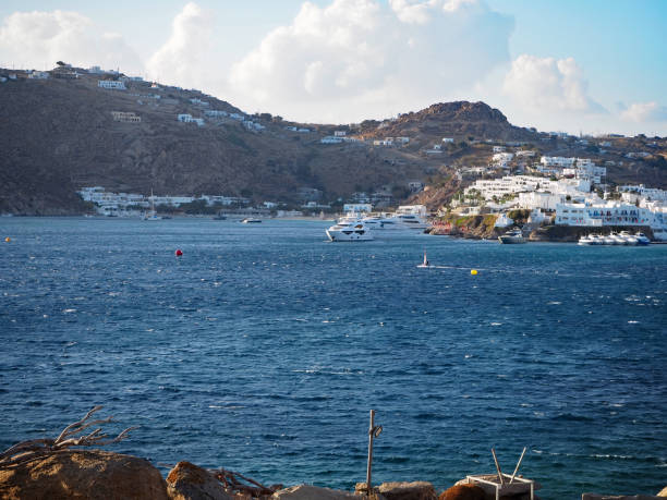 istock Yachts and windsurfer off Mykonos 1481435242