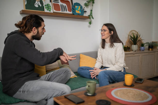 istock Two young friends are speaking in sign language 1481437687