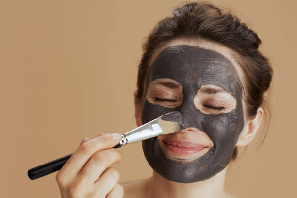 istock modern woman with brush and cosmetic mask 1481439286