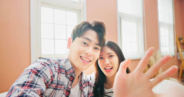 istock couple video chat with friends 1481440231