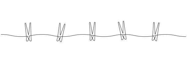 Wooden clothespin in one continuous line drawing. Clothesline with pin and peg for photo album and laundry web design concept in simple linear style. Editable stroke. Doodle vector Wooden clothespin in one continuous line drawing. Clothesline with pin and peg for photo album and laundry web design concept in simple linear style. Editable stroke. Doodle vector. drawing-of-clothes-hanging stock illustrations