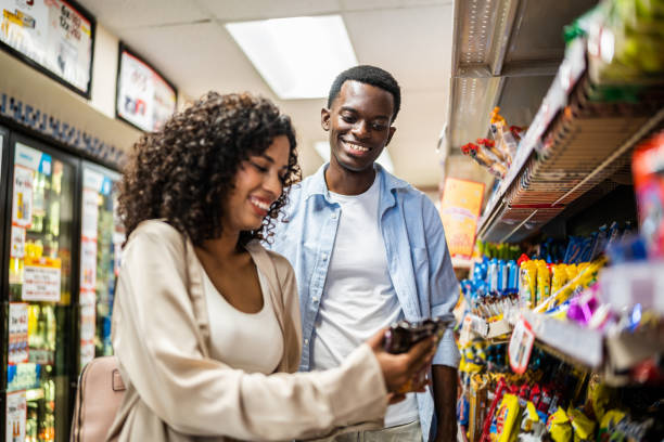istock Young couple shopping at a retail store 1481446152