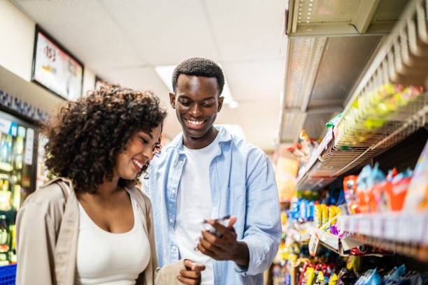 istock Young couple shopping at a retail store 1481446749