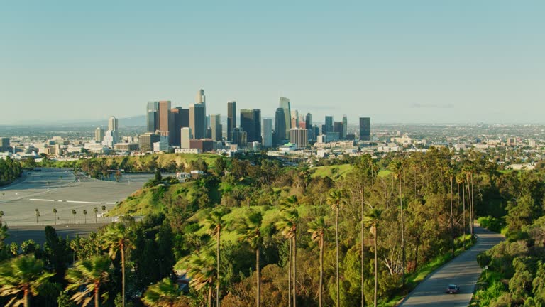 Sweeping Drone Shot of Elysian Park and Downtown Los Angeles Skyline at Sunrise